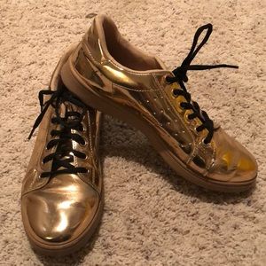 Shiny gold sneakers